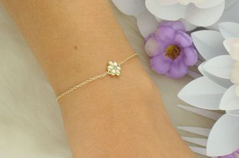 Delikatna bransoletka Nomination Italy z kolekcji Petit Sparkle 242300 012. Srebro 925 pozłacane 18K złotem, ozdobna zawieszka w kształcie kwiatka z cyrkoniami. Regulowana długość 16–19 cm. Orygin (3).jpg